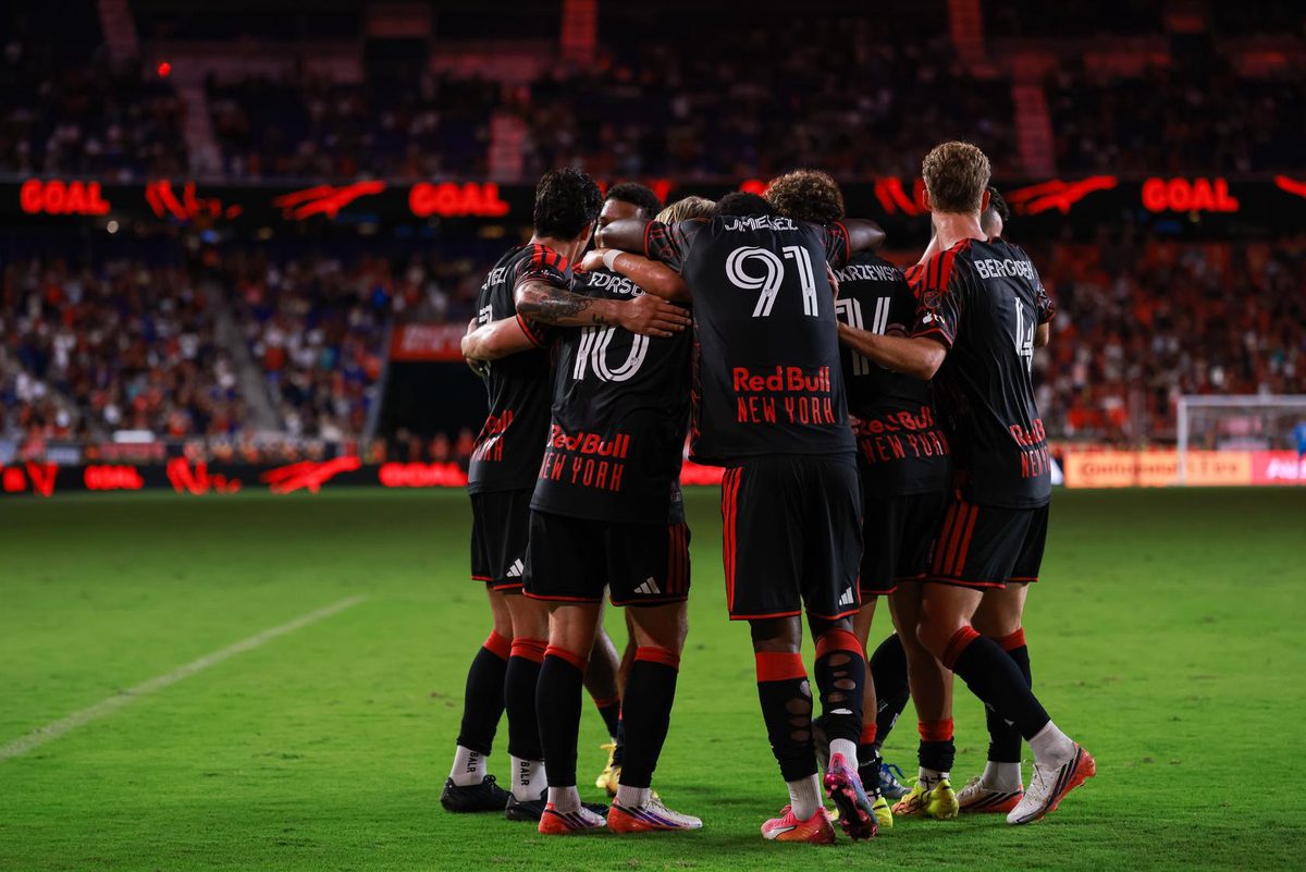 Red Bull New York forward Mijahir Jimenez celebrates with teammates.
