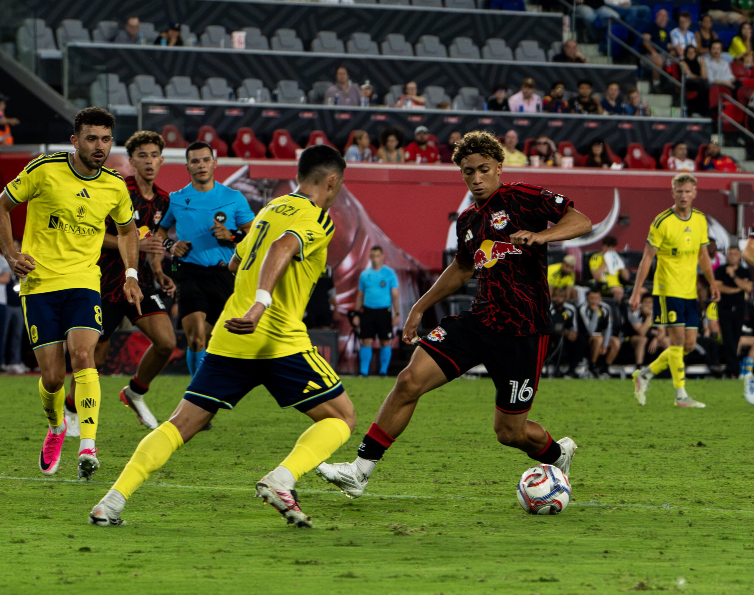 Red Bull New York forward Julian Hall dribbles against Nashville SC.