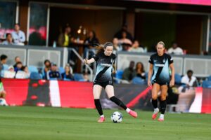 Gotham FC midfielder Rose Lavelle attempts a pass.