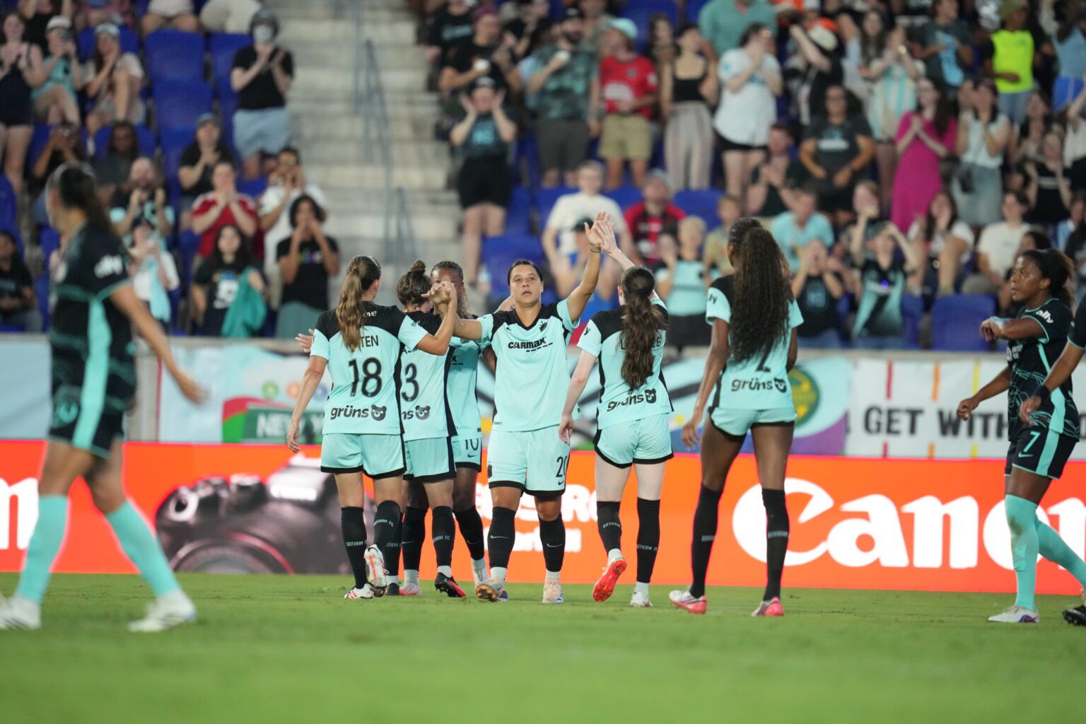 Gotham FC forward Sam Kerr celebrates with teammates.