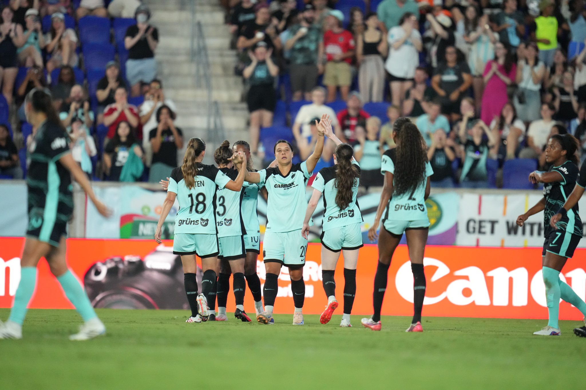 Gotham FC forward Sam Kerr celebrates with teammates.