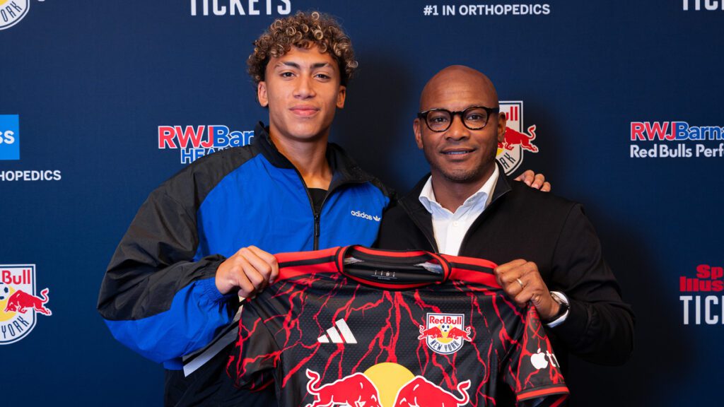 Red Bull New York forward poses with the club's head of sport Julian de Guzman.