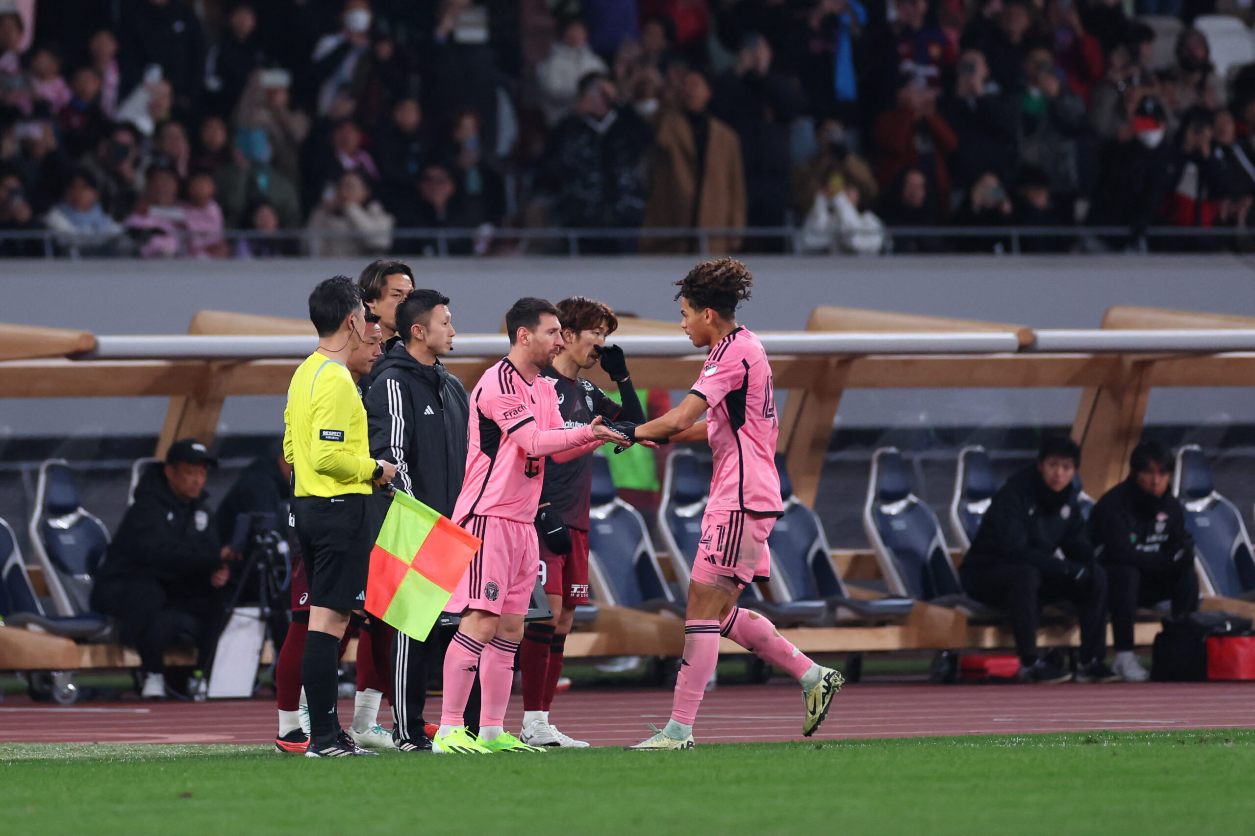 Inter Miami CF forward Lionel Messi is substituted into the game for midfielder David Ruiz during the second half of a preseason friendly against Vissel Kobe at Japan National Stadium.
