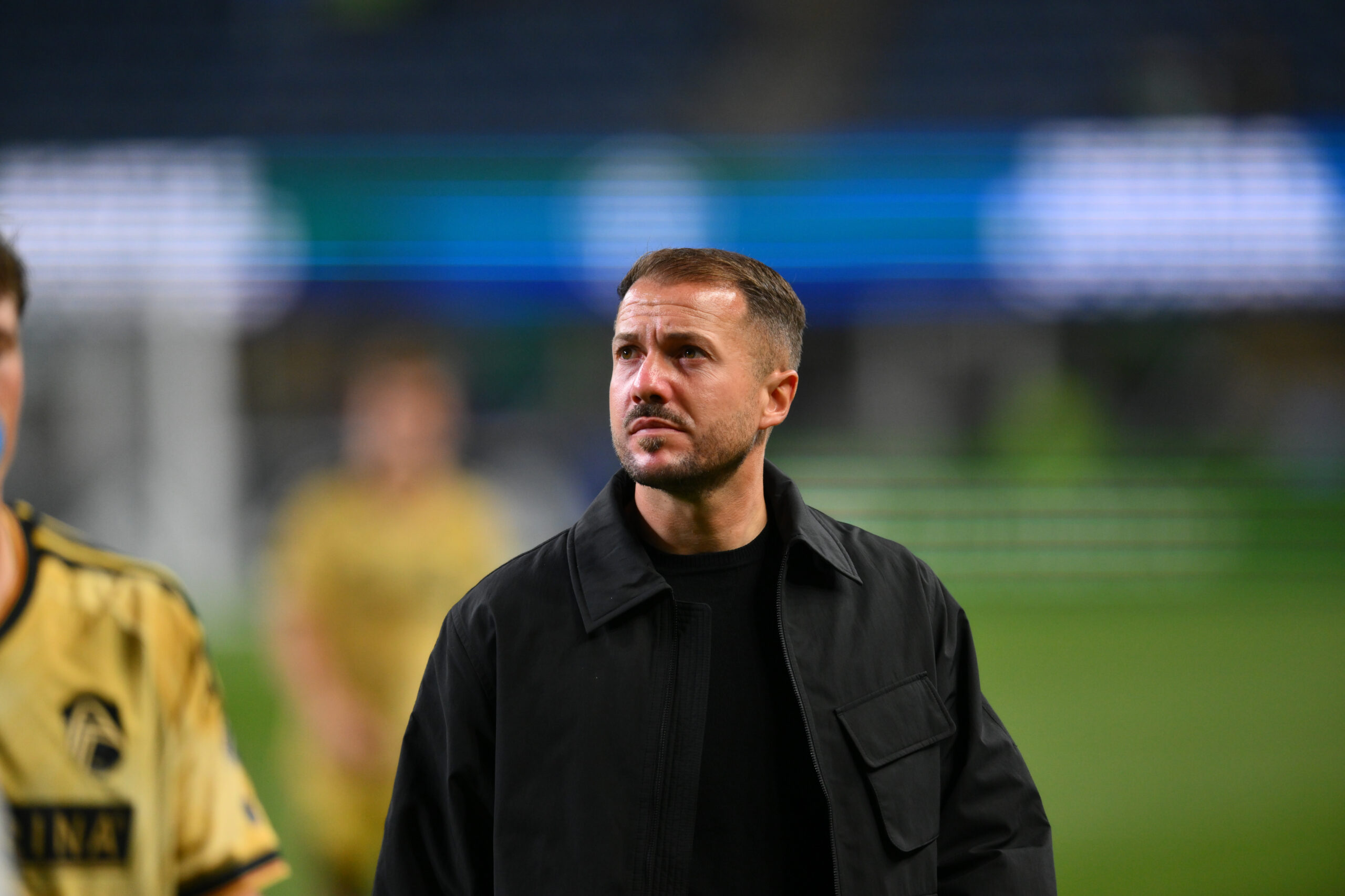 St. Louis CITY SC head coach Yoann Damet walks along the pitch.