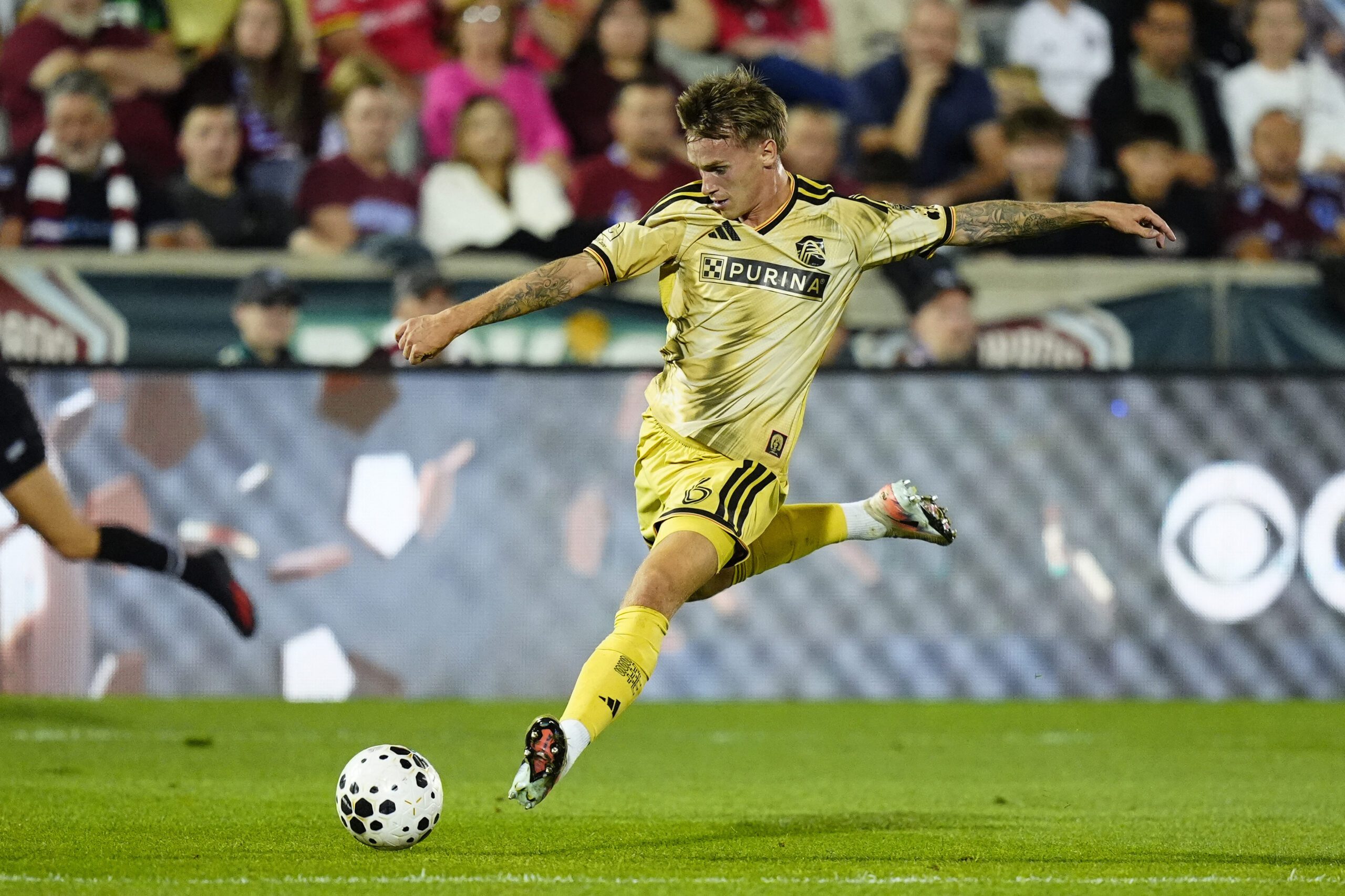 St. Louis CITY SC midfielder Conrad Wallem attempts a pass in the first half against the Colorado Rapids at DICK'S Sporting Goods Park.