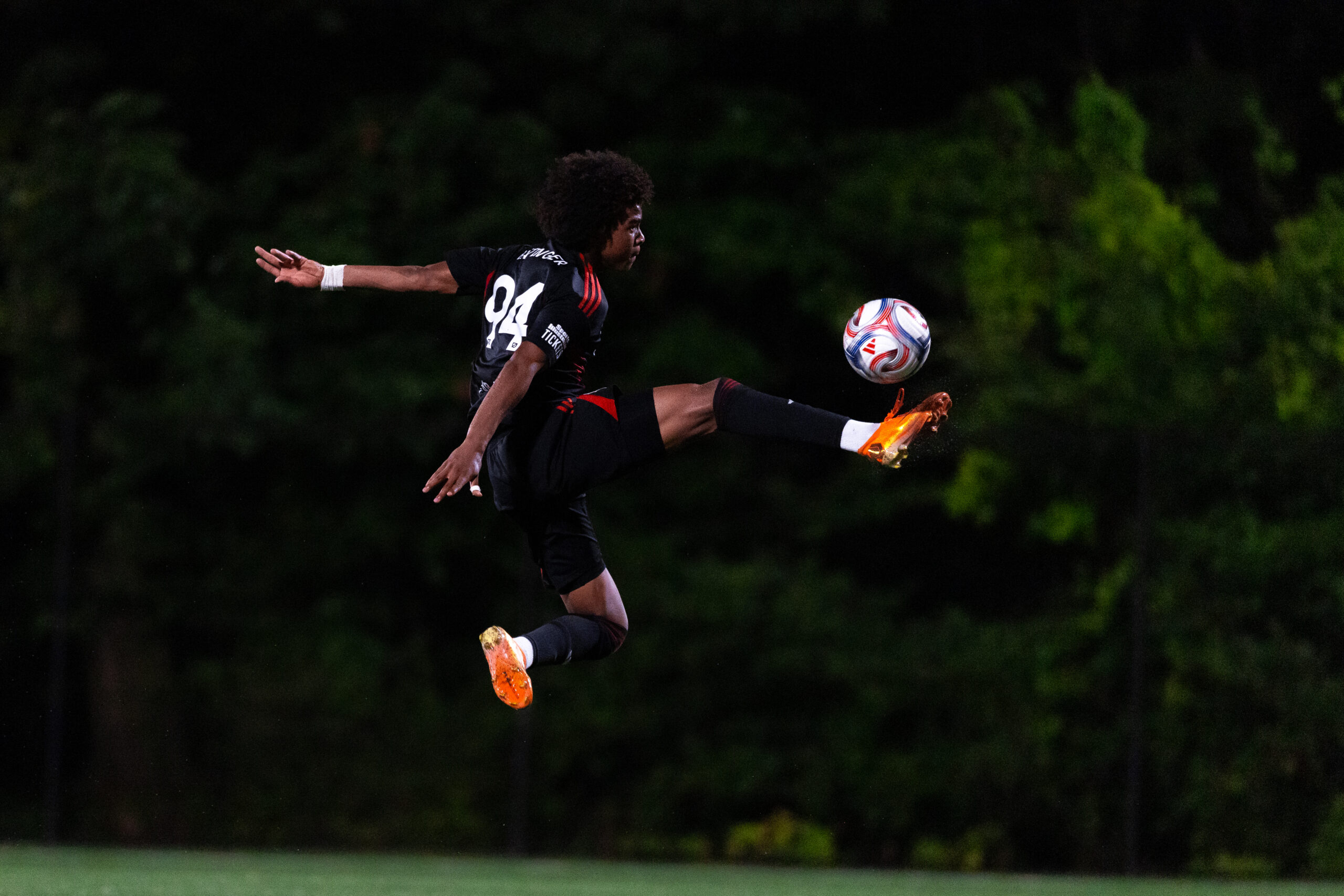 Red Bull New York II winger Sean Baitinger controls the ball.