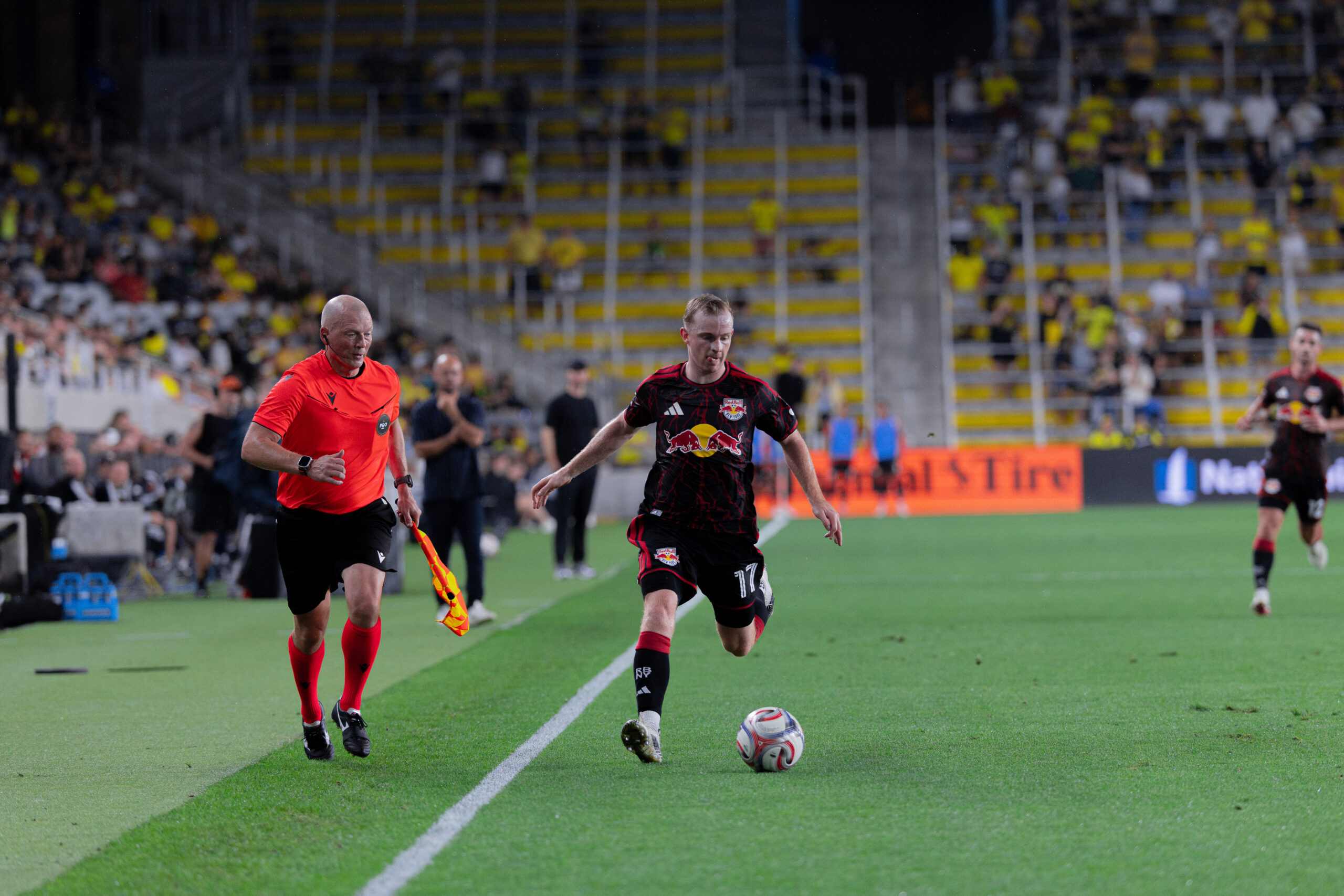 Red Bull New York forward Cameron Harper moves the ball down the wing.
