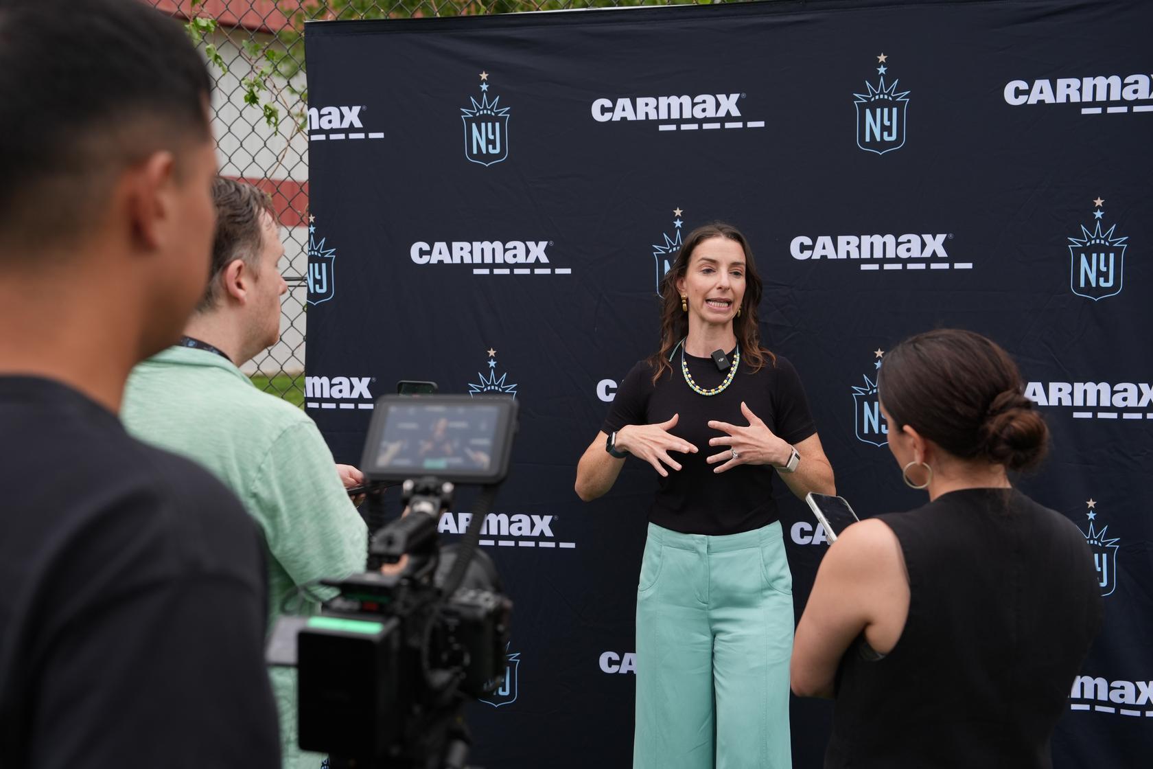 Gotham FC club governor Carolyn Tisch Blodgett speaks to the press at training.