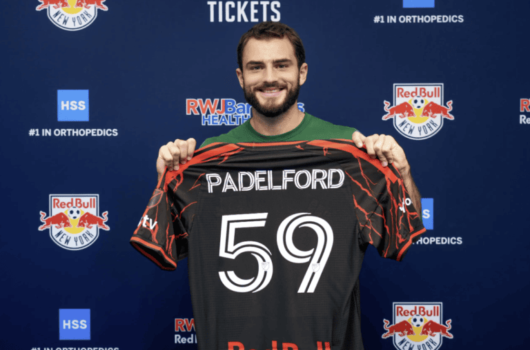 Red Bull New York defender Devin Padelford holds his No. 59 jersey.