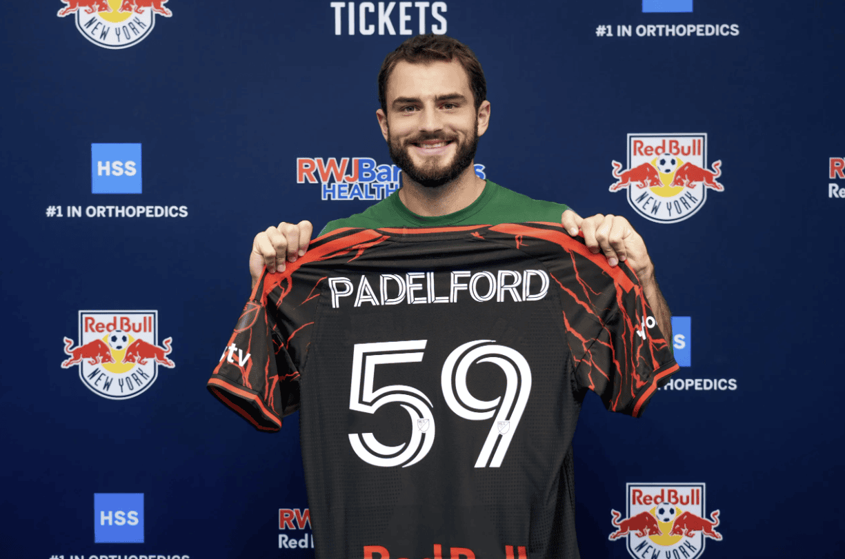Red Bull New York defender Devin Padelford holds his No. 59 jersey.
