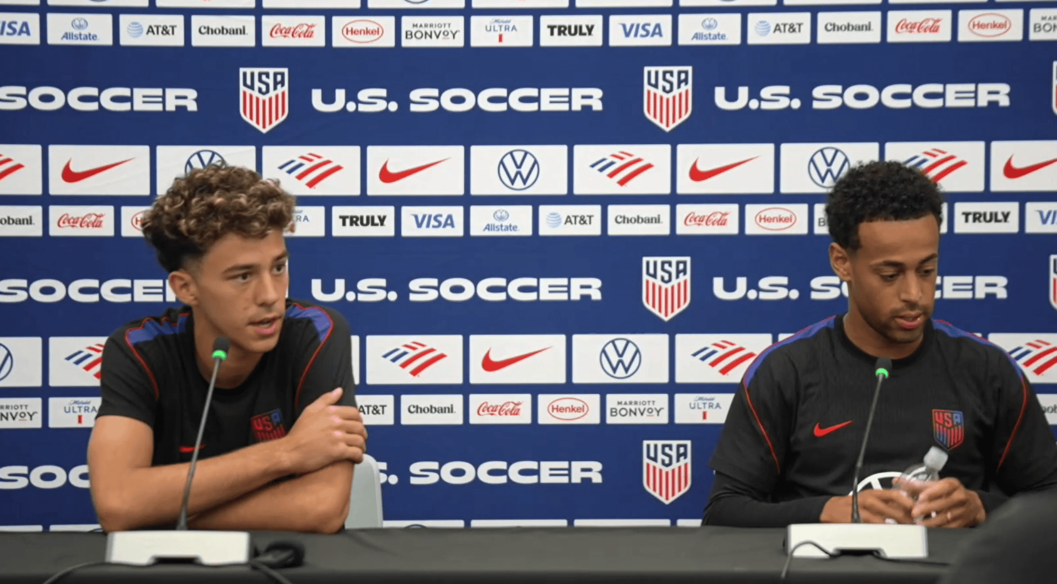 United States men's national team players speak during a press conference.