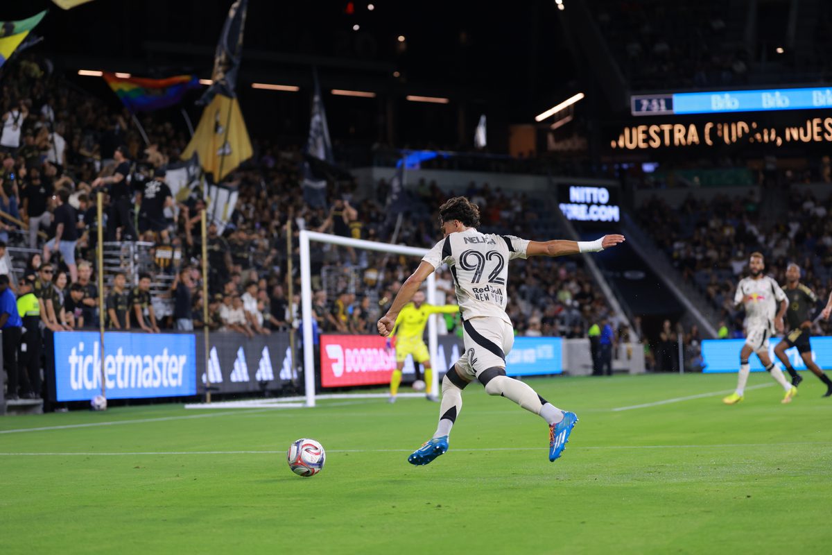 Red Bull New York winger Dennis Nelich attempts a cross.