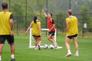 Gotham FC forward Sam Kerr celebrates during a training session.
