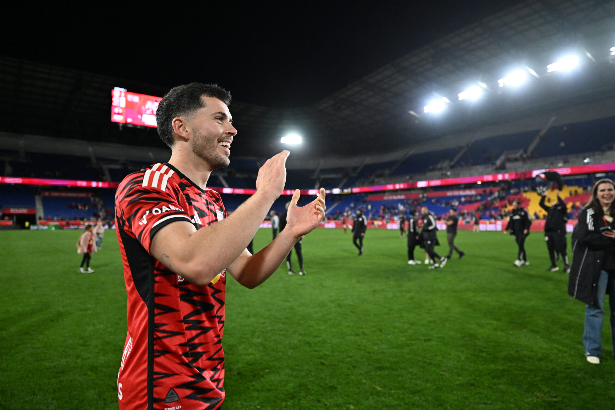 Red Bull New York forward Lewis Morgan celebrates after defeating the Columbus Crew in a 2024 MLS Cup Playoffs Round One match.