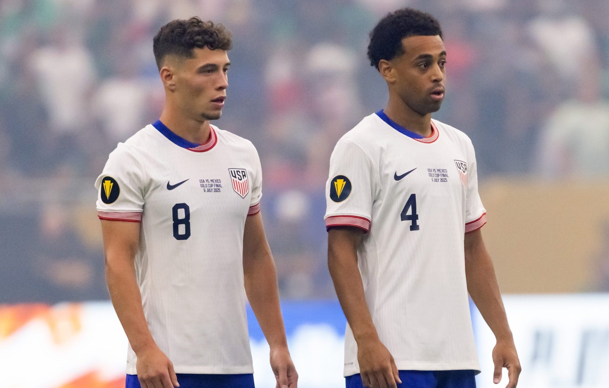 United States men's national team midfielders Sebastian Berhalter and Tyler Adams look on against Mexico during the 2025 Gold Cup Final match at NRG Stadium.