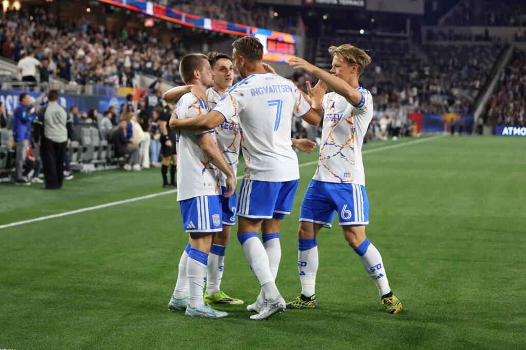 San Diego FC midfielder Anders Dreyer celebrates a goal with Marcus Ingvartsen and Jeppe Tverskov.