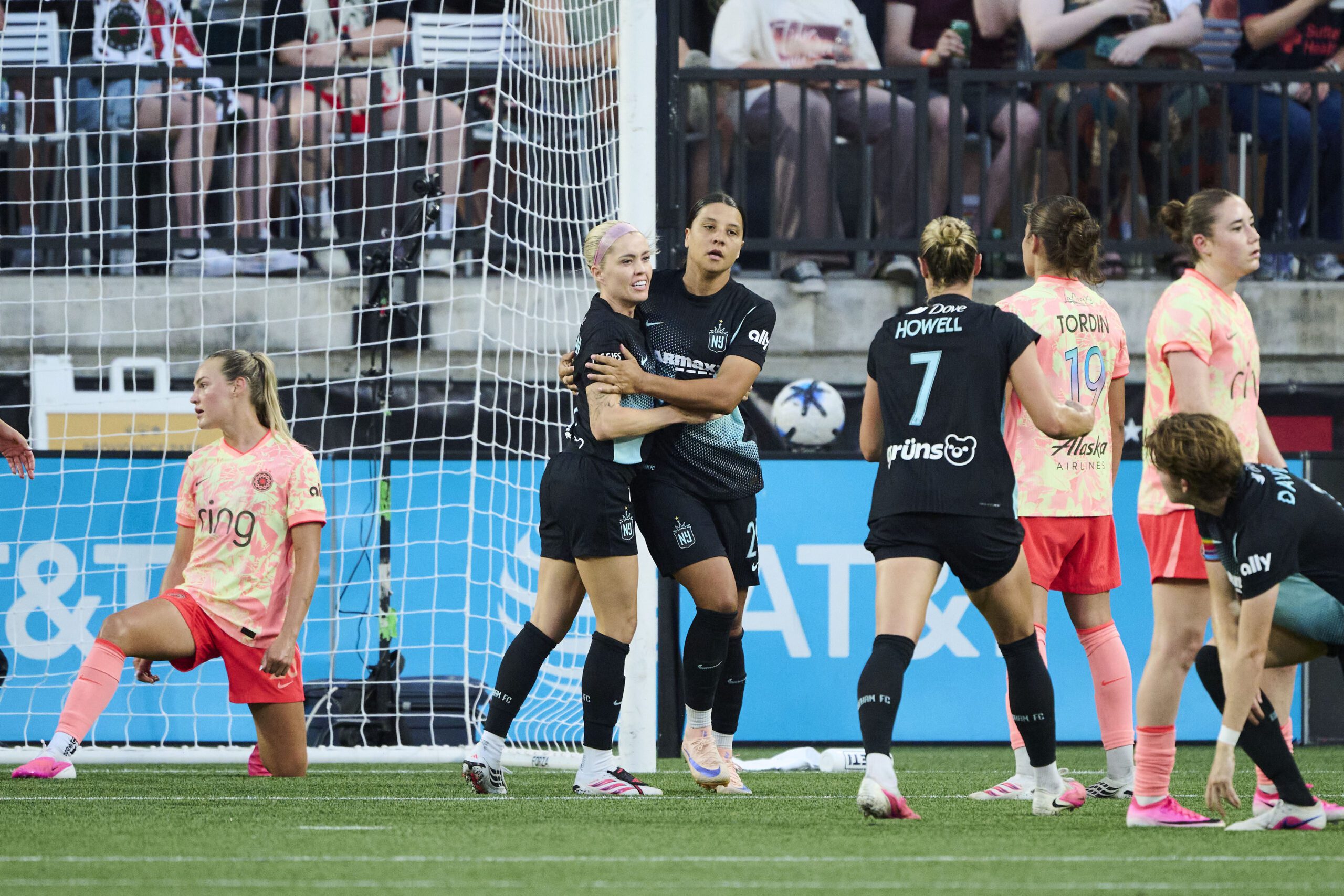 Gotham FC forward Sam Kerr celebrates with midfielder Denise O'Sullivan after scoring a goal during the second half against the Portland Thorns FC at Providence Park.