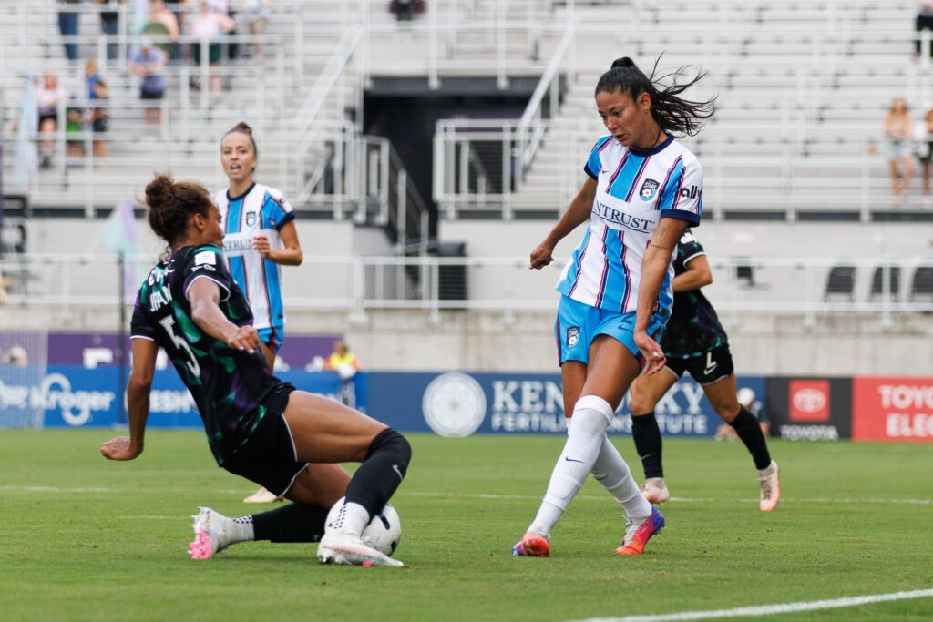 Racing Louisville FC defender Ellie Jean blocks a pass from Chicago Stars FC defender Leila Ouahabi in the first half at Lynn Family Stadium.