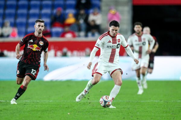 Toronto FC forward Lewis Morgan attempts a pass at Sports Illustrated Stadium.
