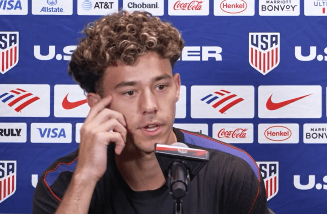 United States men's national team midfielder Adri Mehmeti speaks at a press conference.
